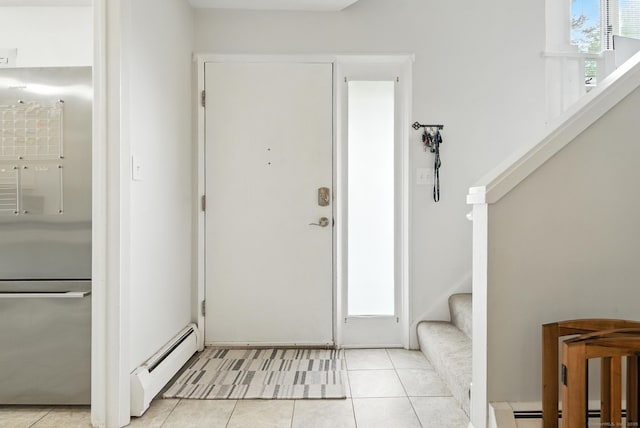 4 Earls Ct Unit 4C, Farmington, CT 06032 - foyer entrance with a baseboard radiator, light tile patterned floors, and stairs