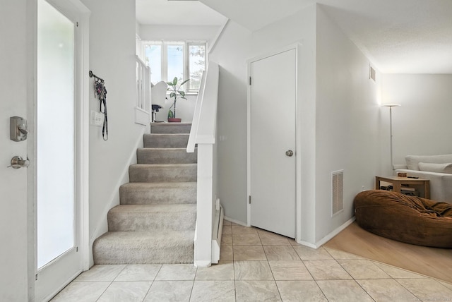 4 Earls Ct Unit 4C, Farmington, CT 06032 - staircase with tile patterned flooring and baseboards
