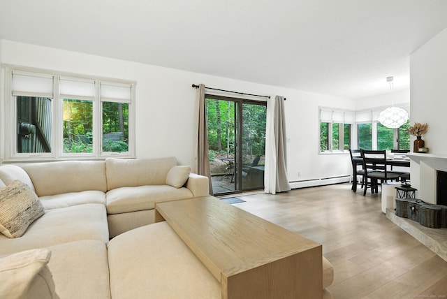 4 Earls Ct Unit 4C, Farmington, CT 06032 - living area featuring wood finished floors and baseboard heating