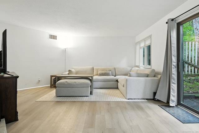 4 Earls Ct Unit 4C, Farmington, CT 06032 - living area with light wood-style flooring and baseboards