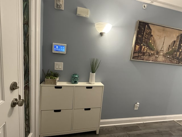 3250 Fairfield Ave Apt 100, Bridgeport, CT 06605 - detailed view of baseboards and wood finished floors