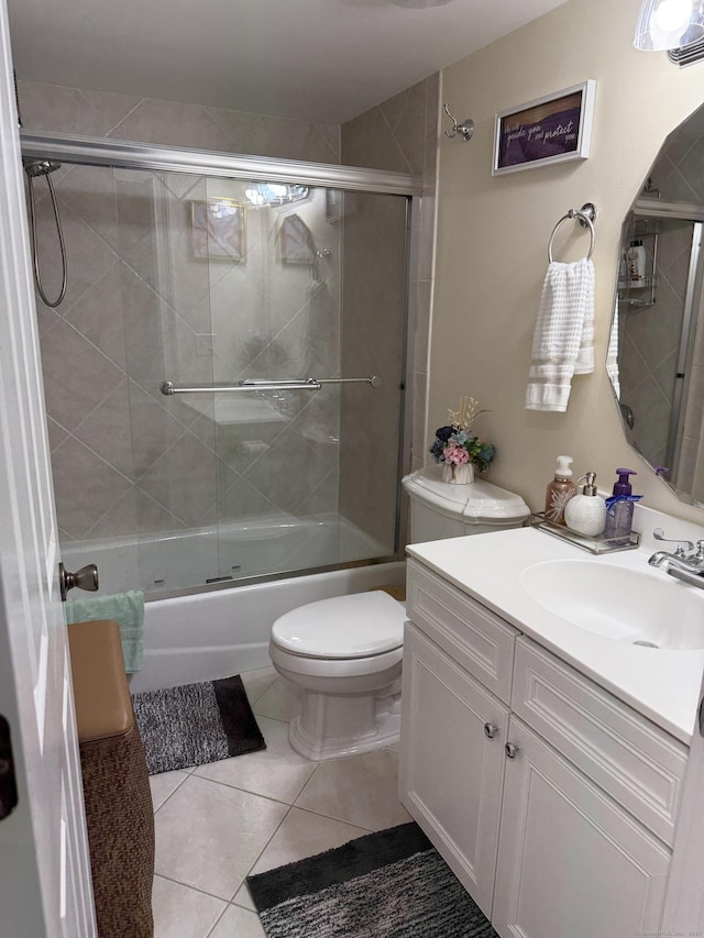 3250 Fairfield Ave Apt 100, Bridgeport, CT 06605 - full bath with vanity, combined bath / shower with glass door, and tile patterned floors