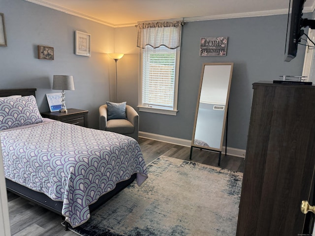 3250 Fairfield Ave Apt 100, Bridgeport, CT 06605 - bedroom with ornamental molding and wood finished floors