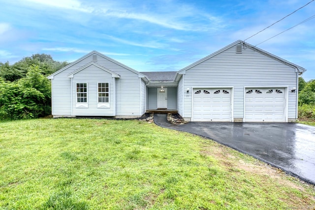 295 Hunting Lodge Rd, Mansfield, CT 06268 - ranch-style home featuring driveway, an attached garage, and a front yard