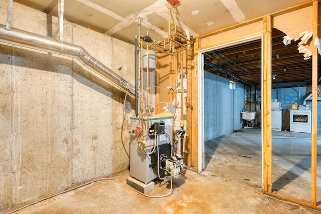 295 Hunting Lodge Rd, Mansfield, CT 06268 - unfinished basement with washer / clothes dryer and a heating unit