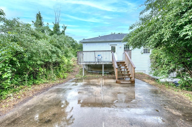 295 Hunting Lodge Rd, Mansfield, CT 06268 - rear view of property with a wooden deck and a shingled roof