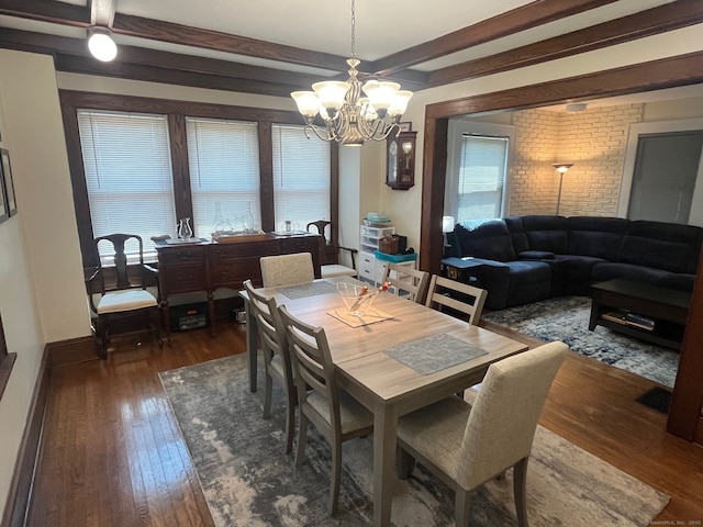 50 Wheeler Ter, Stratford, CT 06614 - dining room featuring a chandelier, dark wood-style floors, and beamed ceiling
