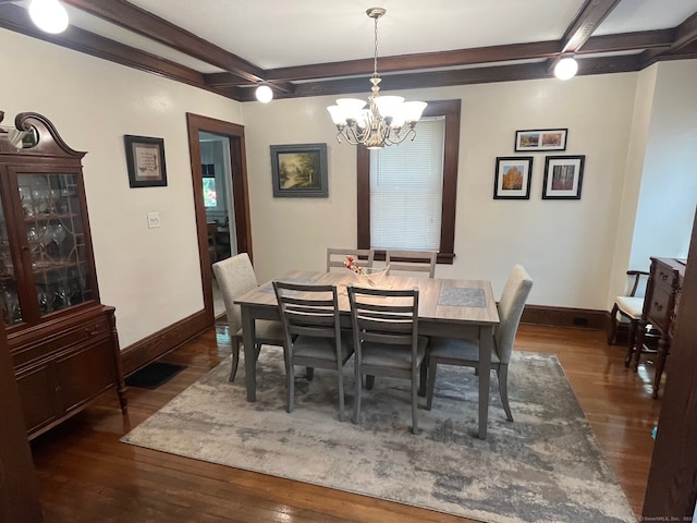 50 Wheeler Ter, Stratford, CT 06614 - dining area featuring a chandelier, beam ceiling, and wood finished floors