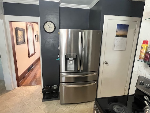 50 Wheeler Ter, Stratford, CT 06614 - kitchen featuring stainless steel fridge, electric stove, and ornamental molding
