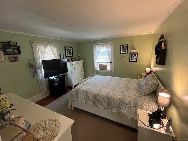 50 Wheeler Ter, Stratford, CT 06614 - bedroom featuring multiple windows, dark wood finished floors, crown molding, and cooling unit