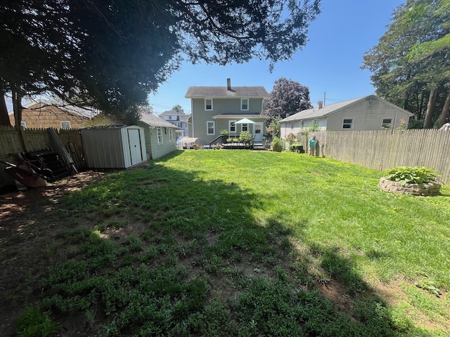 50 Wheeler Ter, Stratford, CT 06614 - fenced backyard featuring a shed and a wooden deck