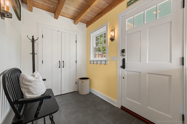 52 Aunt Park Ln, Newtown, CT 06470 - entryway featuring a wooden ceiling with exposed beams and baseboards