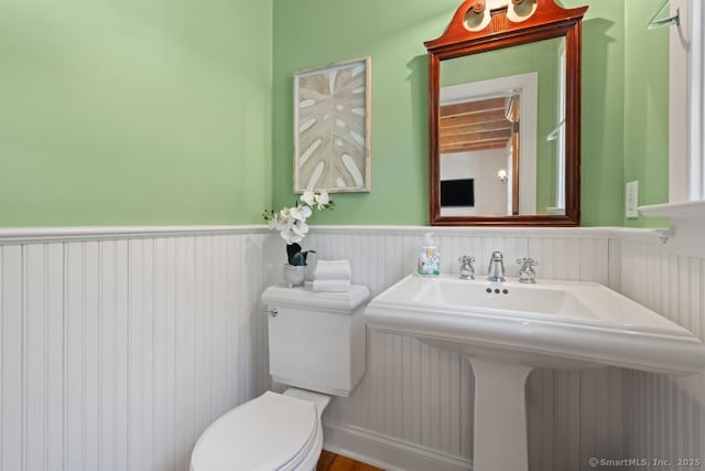 52 Aunt Park Ln, Newtown, CT 06470 - bathroom with wainscoting and toilet