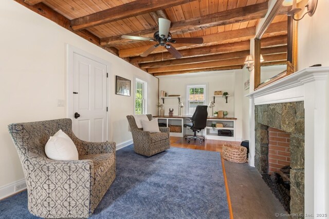 52 Aunt Park Ln, Newtown, CT 06470 - living room featuring a wood ceiling with exposed beams, a fireplace, a ceiling fan, a desk, and wood finished floors
