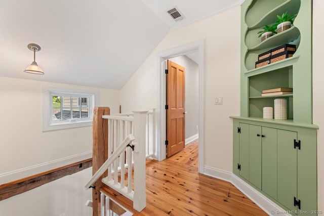 52 Aunt Park Ln, Newtown, CT 06470 - hall with light wood finished floors, an upstairs landing, and vaulted ceiling