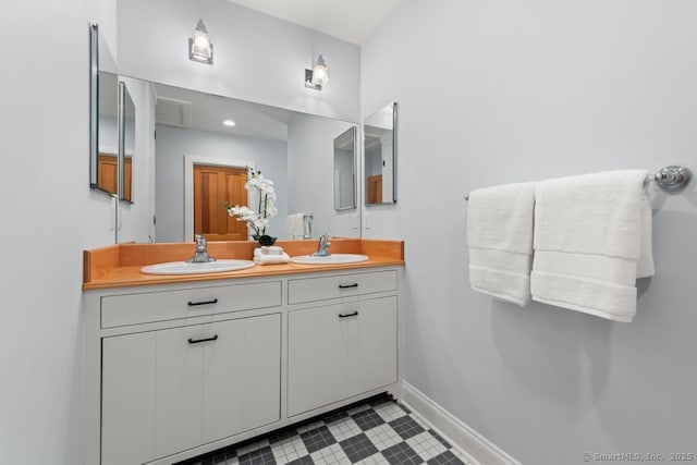 52 Aunt Park Ln, Newtown, CT 06470 - full bath with double vanity and baseboards