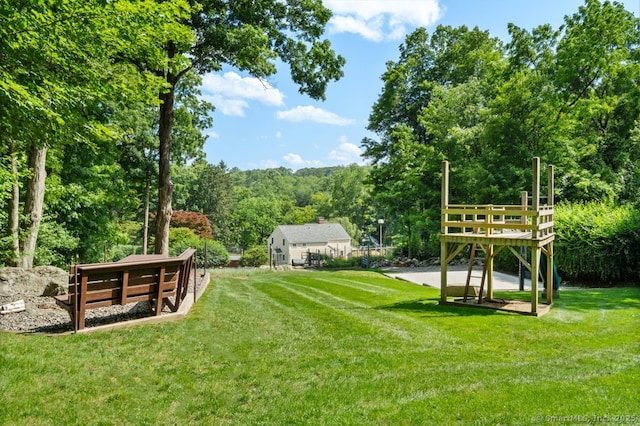 52 Aunt Park Ln, Newtown, CT 06470 - view of grassy yard featuring a wooded view