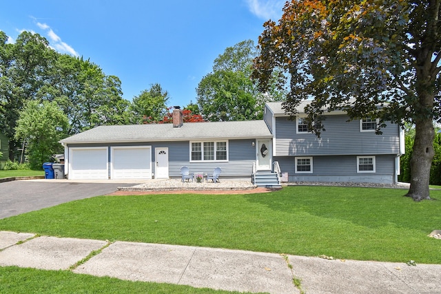 6 Bel Aire Dr, Plainville, CT 06062 - split level home featuring an attached garage, asphalt driveway, a front lawn, and a chimney