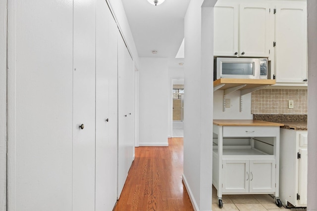 3 Stebbins Close Close Unit 3, Ridgefield, CT 06877 - hall with light wood-style flooring and baseboards