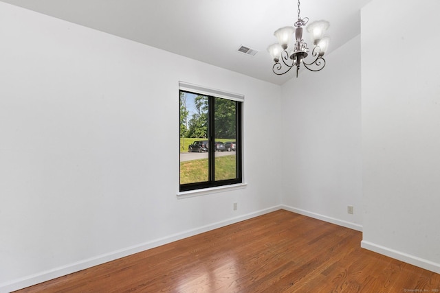 3 Stebbins Close Close Unit 3, Ridgefield, CT 06877 - unfurnished room with a chandelier and wood finished floors