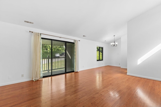 3 Stebbins Close Close Unit 3, Ridgefield, CT 06877 - empty room with a chandelier and wood finished floors