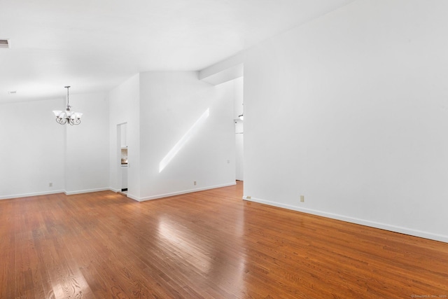 3 Stebbins Close Close Unit 3, Ridgefield, CT 06877 - unfurnished room with a chandelier and wood finished floors