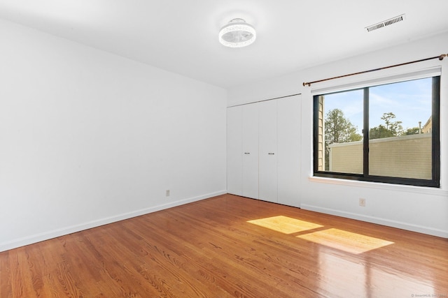 3 Stebbins Close Close Unit 3, Ridgefield, CT 06877 - unfurnished bedroom featuring wood finished floors and a closet