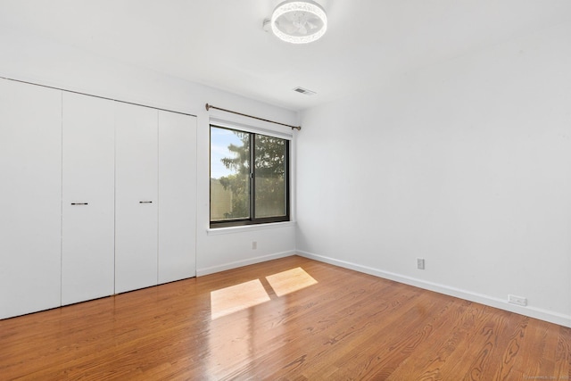 3 Stebbins Close Close Unit 3, Ridgefield, CT 06877 - unfurnished bedroom featuring wood finished floors and a closet