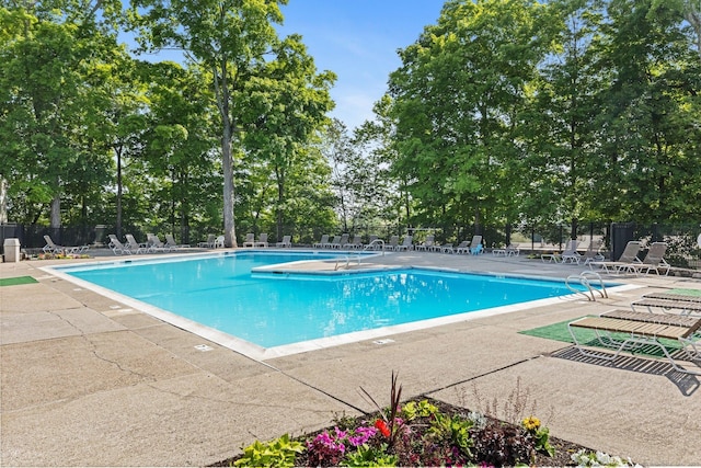 3 Stebbins Close Close Unit 3, Ridgefield, CT 06877 - community pool with a patio and view of scattered trees