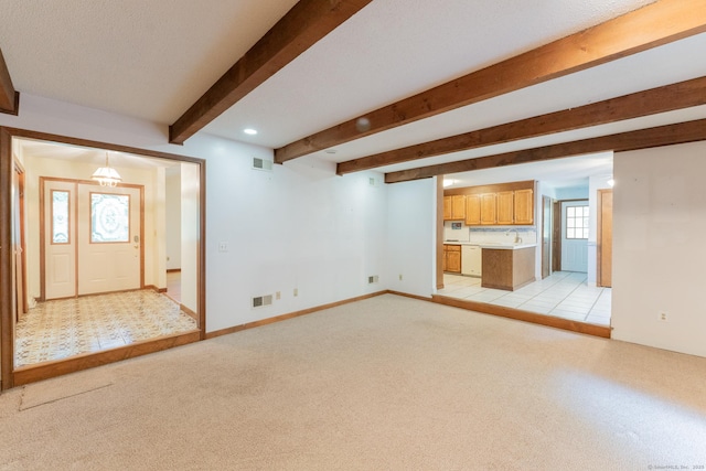 54 Timber Ln, Avon, CT 06001 - unfurnished living room with beamed ceiling, light carpet, and recessed lighting
