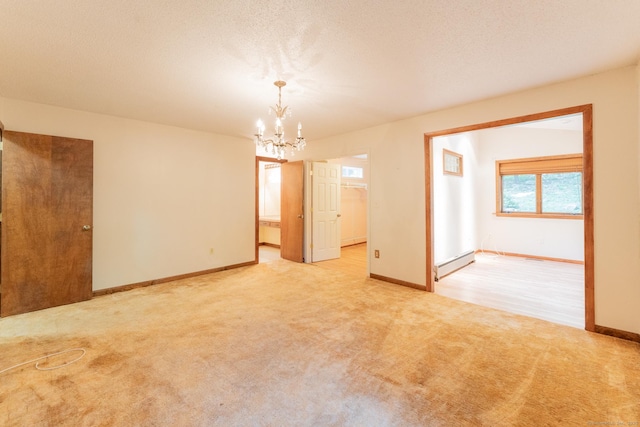 54 Timber Ln, Avon, CT 06001 - empty room featuring a chandelier, carpet flooring, and baseboard heating