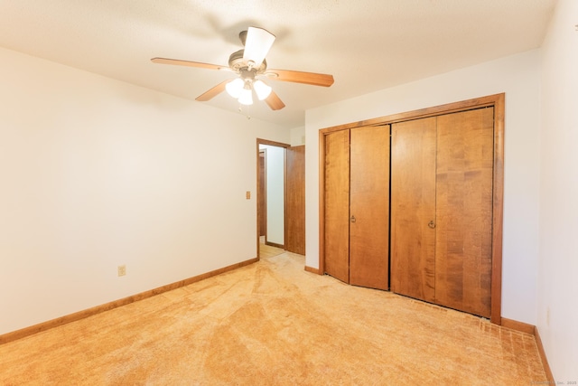 54 Timber Ln, Avon, CT 06001 - unfurnished bedroom with a closet, light colored carpet, and a ceiling fan