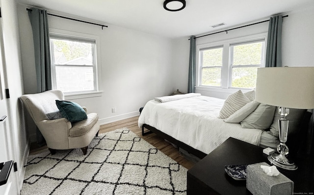 27 Mary Ln, Greenwich, CT 06878 - bedroom featuring wood finished floors and multiple windows