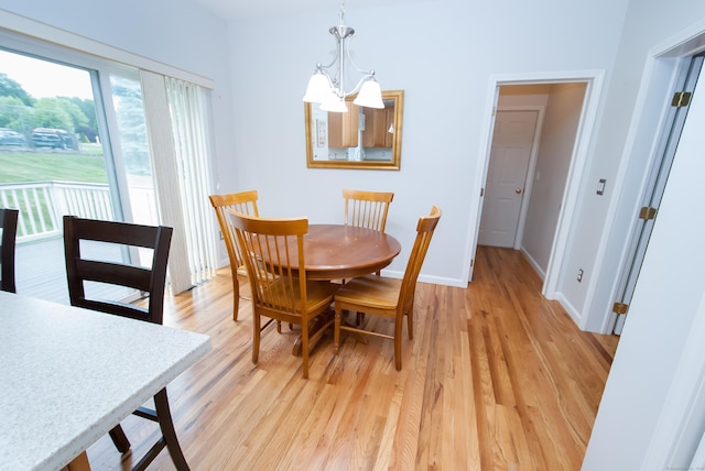 6 Fawn Meadow Dr, Naugatuck, CT 06770 - dining room featuring a chandelier and light wood-style floors