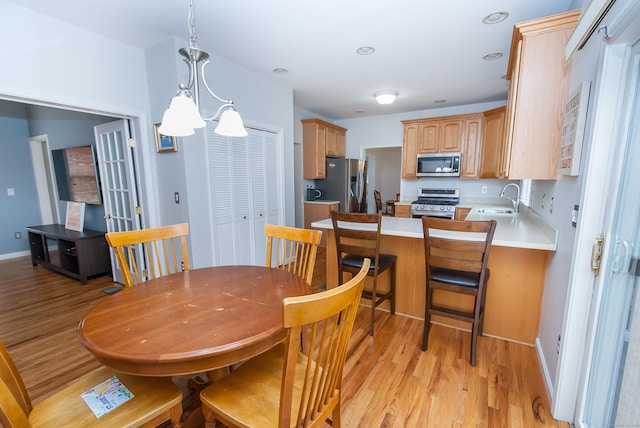 6 Fawn Meadow Dr, Naugatuck, CT 06770 - dining space featuring light wood-style flooring and a chandelier