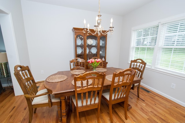 6 Fawn Meadow Dr, Naugatuck, CT 06770 - dining room featuring a chandelier and light wood-type flooring