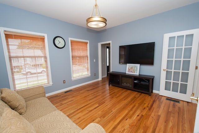 6 Fawn Meadow Dr, Naugatuck, CT 06770 - living area with plenty of natural light and light wood-style floors
