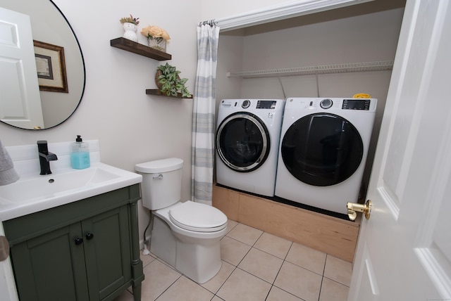 6 Fawn Meadow Dr, Naugatuck, CT 06770 - bathroom featuring washer and dryer, vanity, and tile patterned floors