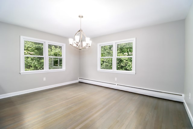 22 Lonetown Rd, Redding, CT 06896 - unfurnished room featuring a baseboard heating unit, a chandelier, plenty of natural light, and wood finished floors