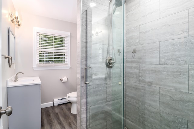 22 Lonetown Rd, Redding, CT 06896 - bathroom with wood finished floors, vanity, a stall shower, and a baseboard radiator