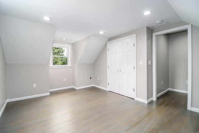 22 Lonetown Rd, Redding, CT 06896 - additional living space with lofted ceiling, wood finished floors, and recessed lighting