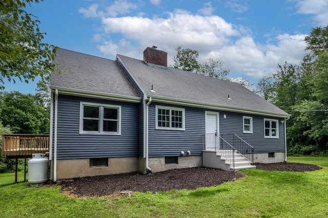 22 Lonetown Rd, Redding, CT 06896 - rear view of house featuring a chimney, a yard, roof with shingles, and a wooden deck