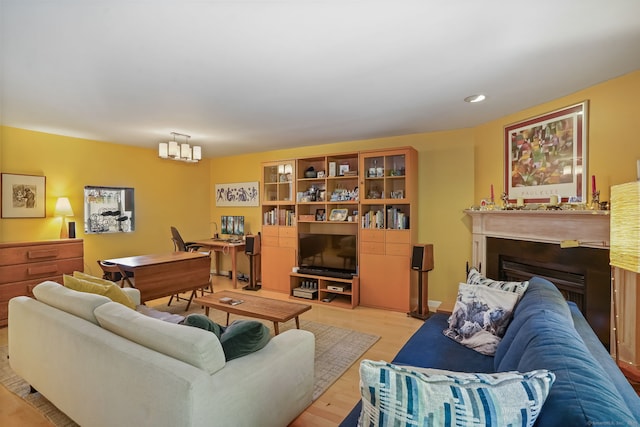 123 Old Belden Hill Rd Apt 24, Norwalk, CT 06850 - living area with a fireplace and light wood-type flooring