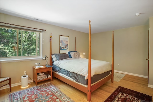 123 Old Belden Hill Rd Apt 24, Norwalk, CT 06850 - bedroom featuring light wood-style flooring and baseboards