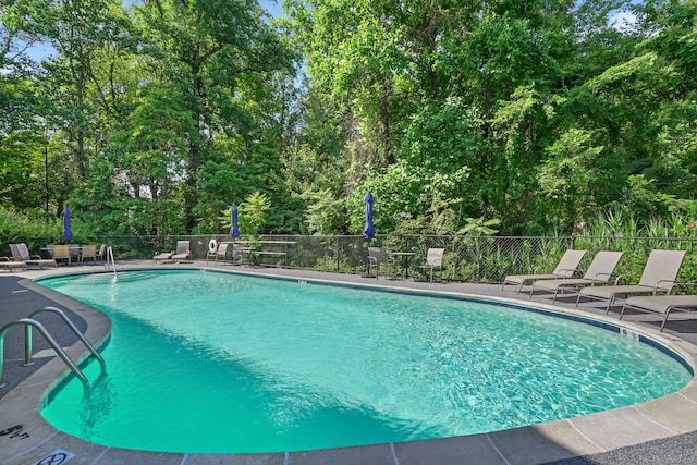 123 Old Belden Hill Rd Apt 24, Norwalk, CT 06850 - community pool featuring a patio area and view of scattered trees