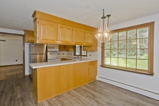 417 Billings Rd, Somers, CT 06071 - kitchen featuring white appliances, baseboard heating, wood finished floors, and light countertops