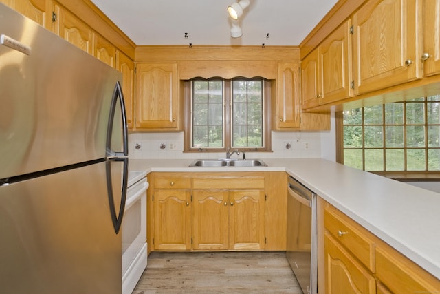 417 Billings Rd, Somers, CT 06071 - kitchen featuring appliances with stainless steel finishes, light countertops, and backsplash