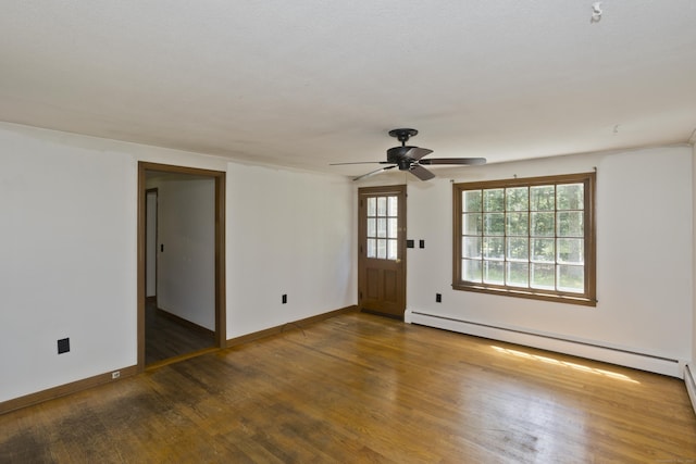 417 Billings Rd, Somers, CT 06071 - spare room with baseboard heating, wood finished floors, and ceiling fan