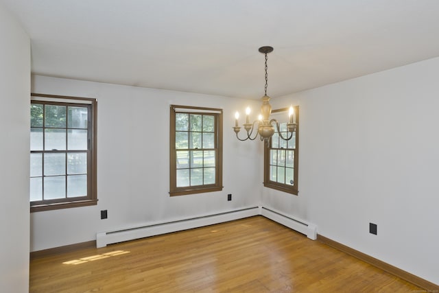 417 Billings Rd, Somers, CT 06071 - unfurnished room featuring a chandelier, plenty of natural light, light wood-style flooring, and baseboard heating