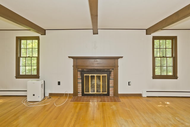 417 Billings Rd, Somers, CT 06071 - unfurnished living room with beam ceiling, wood finished floors, a baseboard radiator, and a fireplace